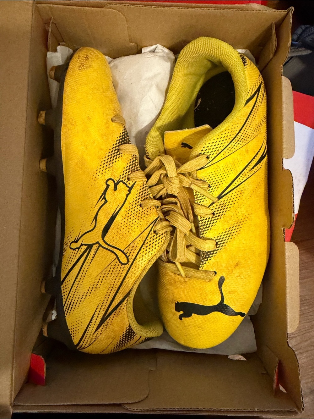 Puma Kids Yellow Soccer Cleats with Black Logo